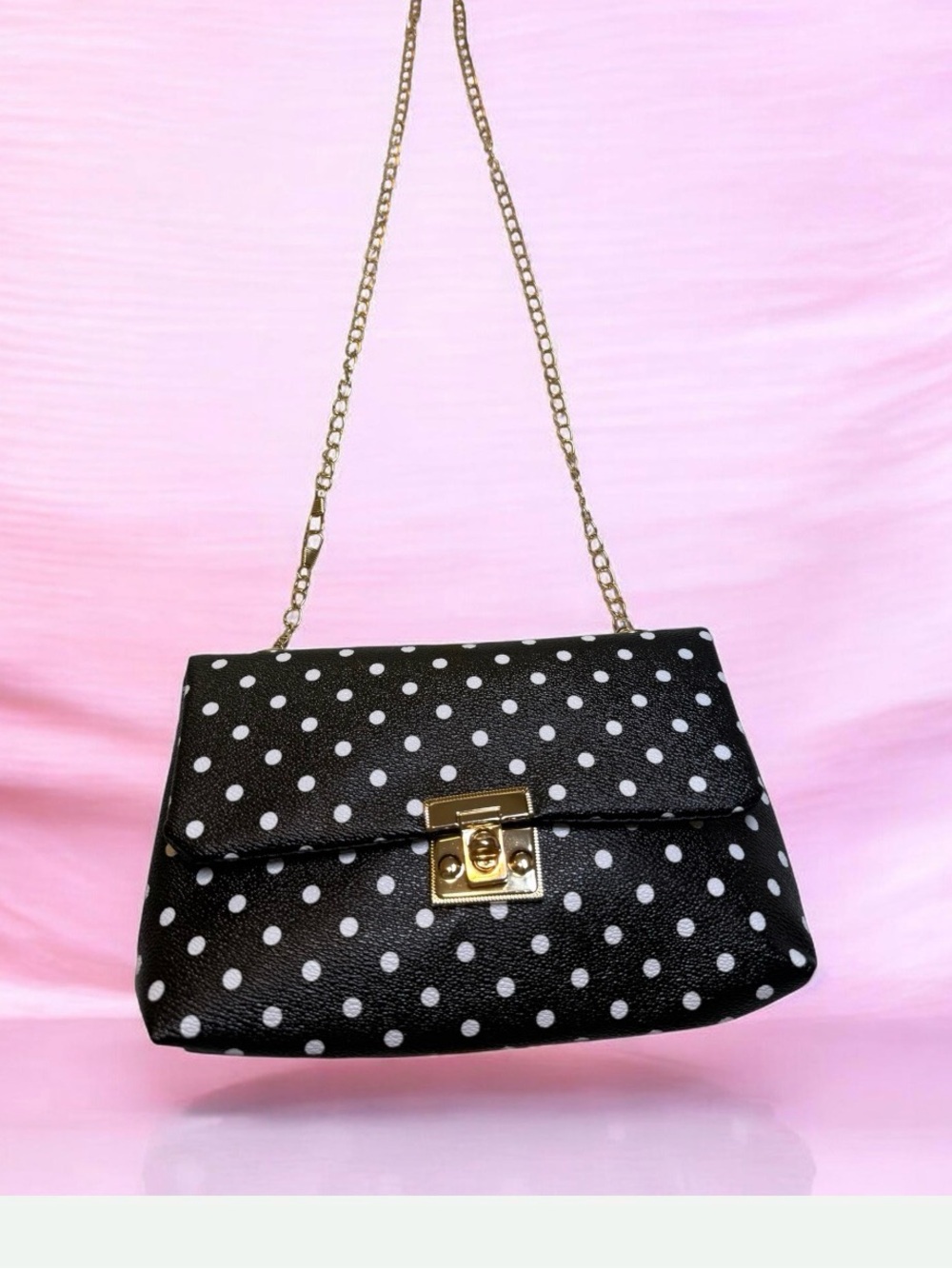 Black & White Polka Dot Shoulder Bag With Gold Chain.